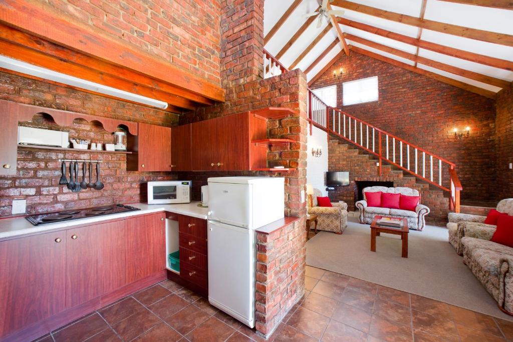 Una cocina o cocineta en Swallows Nest Country Cottages