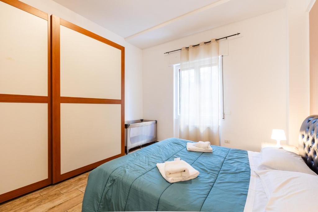 Postel nebo postele na pokoji v ubytování Casa Vacanze La Sirenetta