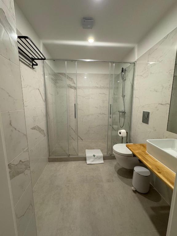 Koupelna v ubytování Promenaden Hotel