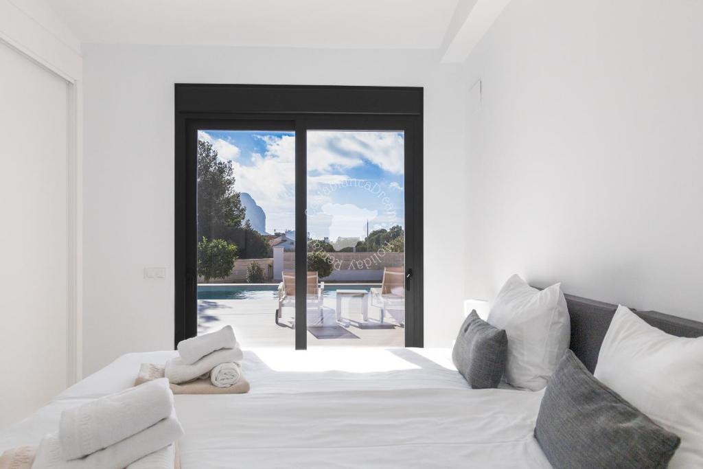 Postel nebo postele na pokoji v ubytování CostaBlancaDreams Buenavista en Calpe