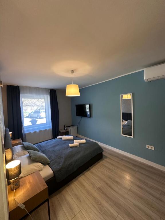 Łóżko lub łóżka w pokoju w obiekcie Jager Guesthouse