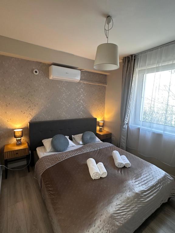 Łóżko lub łóżka w pokoju w obiekcie Jager Guesthouse