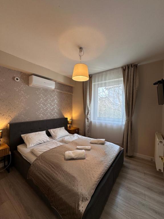Łóżko lub łóżka w pokoju w obiekcie Jager Guesthouse