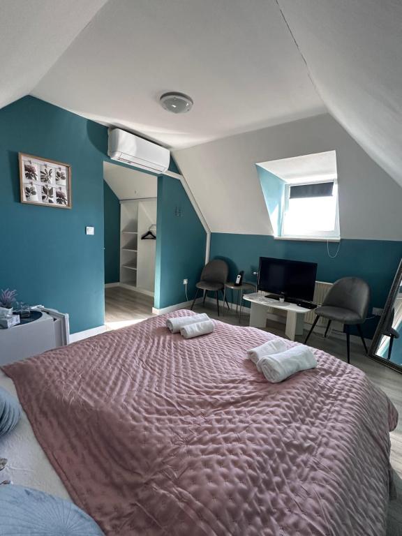 Łóżko lub łóżka w pokoju w obiekcie Jager Guesthouse