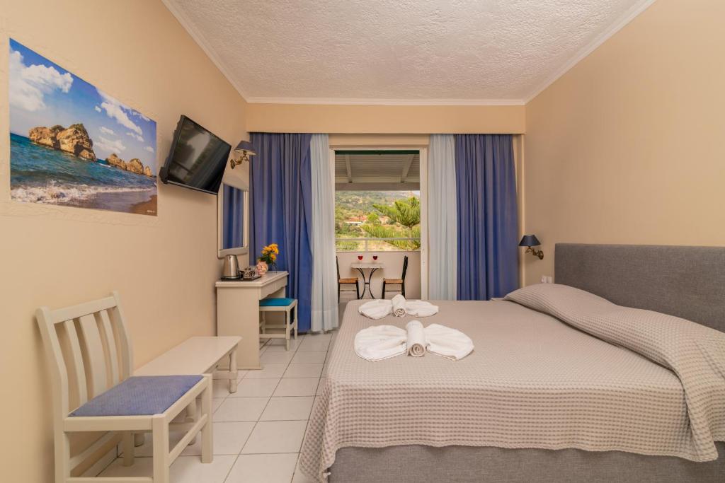 Postel nebo postele na pokoji v ubytování Matilda Hotel