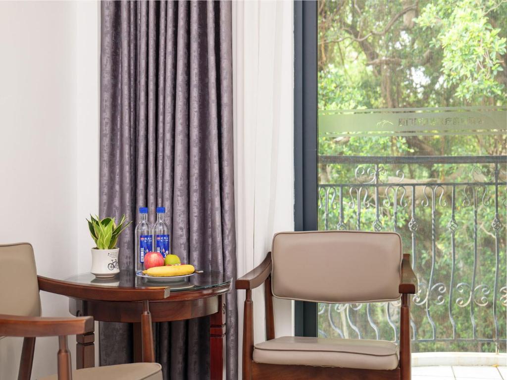 Balkón nebo terasa v ubytování Xiamen Kulangsu Resort Hotel