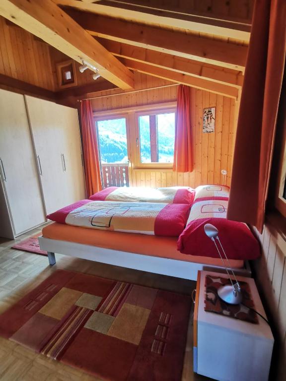 Postel nebo postele na pokoji v ubytování Chalet Edi