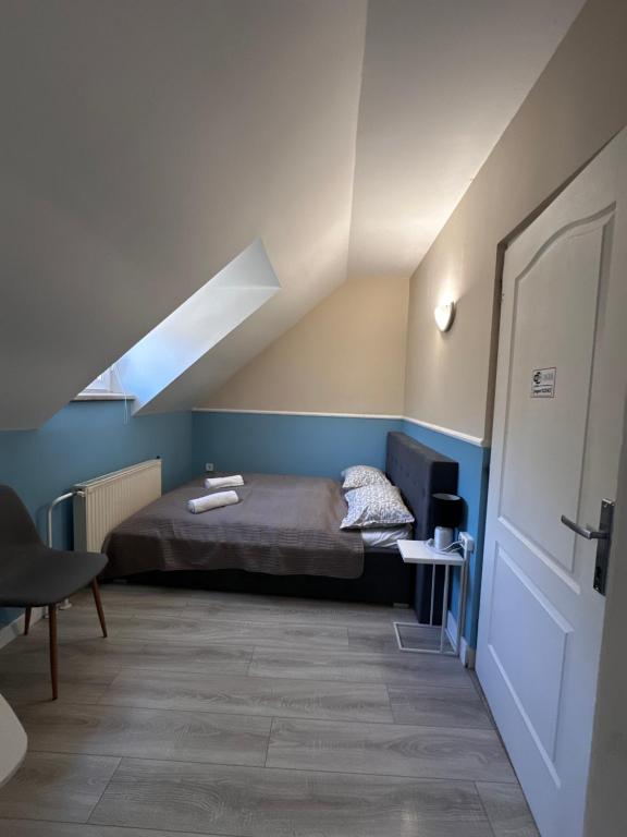 Łóżko lub łóżka w pokoju w obiekcie Jager Guesthouse