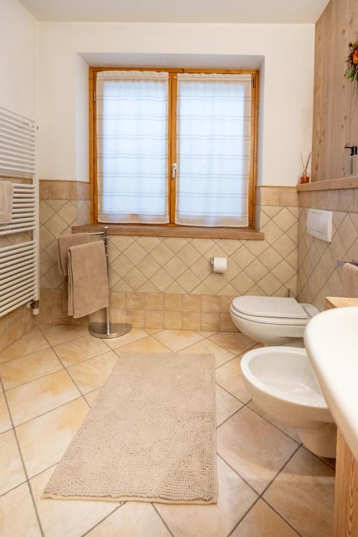 Koupelna v ubytování Taverna Larice