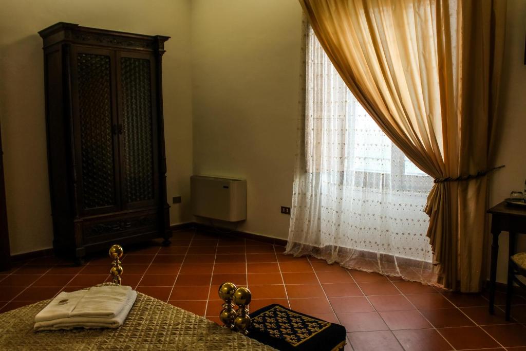 Postel nebo postele na pokoji v ubytování Castel di Pietra