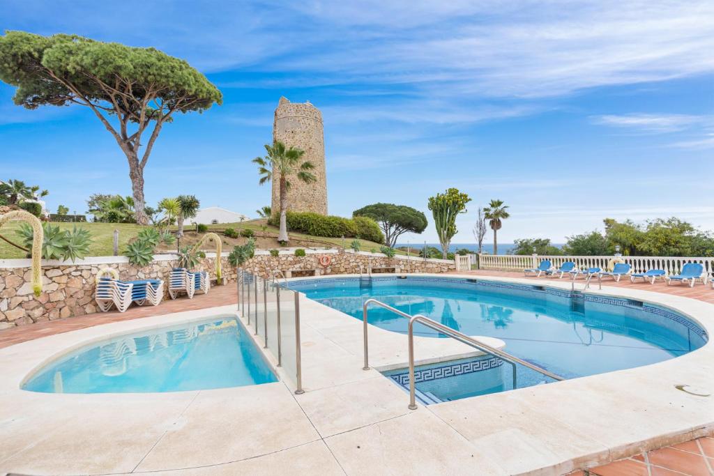 Bazén v ubytovaní Charming seaview apartment with pool in La Cala by Costarentals - Ref 49 alebo v jeho blízkosti