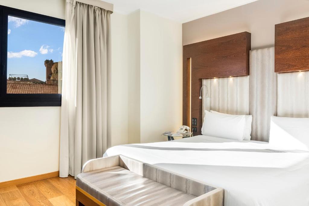 Postel nebo postele na pokoji v ubytování Art Hotel Navigli