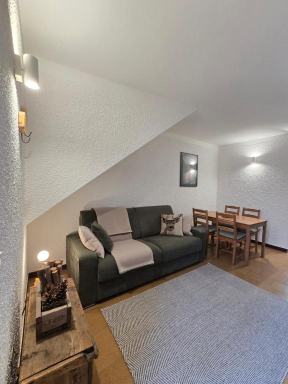 A seating area at bb26 apartment mountain Lozio