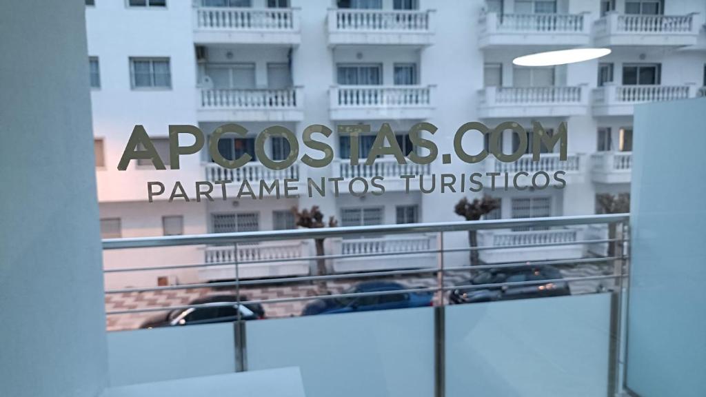 a sign on the side of a building at APCOSTAS Els Pins Lotus in Blanes
