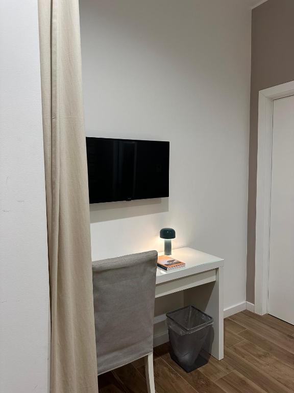 Telewizja i/lub zestaw kina domowego w obiekcie Olivia Rooms Eurialo