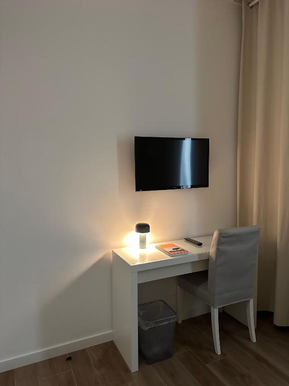 Telewizja i/lub zestaw kina domowego w obiekcie Olivia Rooms Eurialo