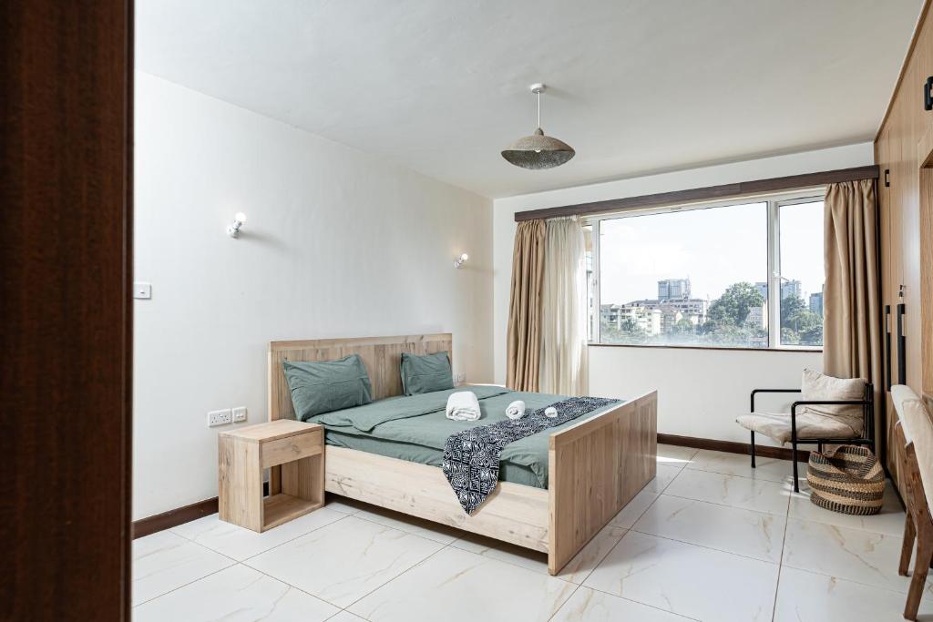 Postel nebo postele na pokoji v ubytování Silvermist Two & Three Bedrooms Wonderiss Homes Westland Living with close proximity to UN, Karura forest & Sarit Mall