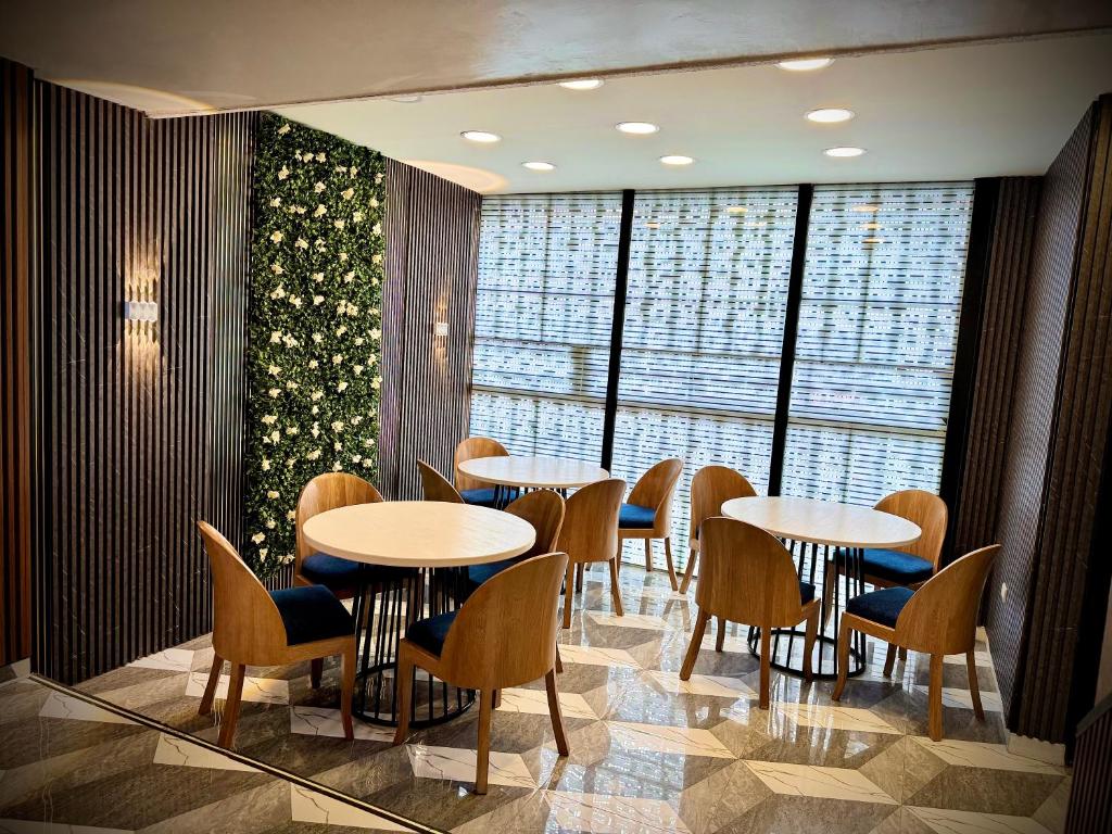 Posezení v ubytování Hotel American Visa Normandia