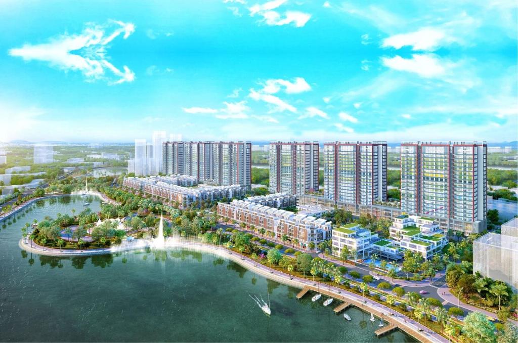 an aerial view of a city with buildings and water at Khai Sơn Apartment 2Bedrooms in Hanoi