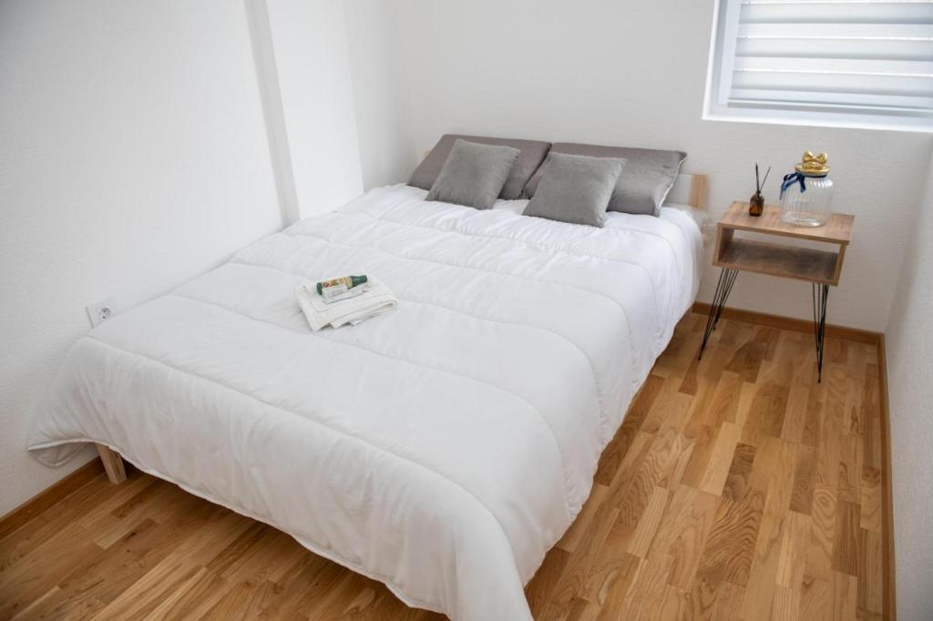 Postel nebo postele na pokoji v ubytování Apartman Tasic