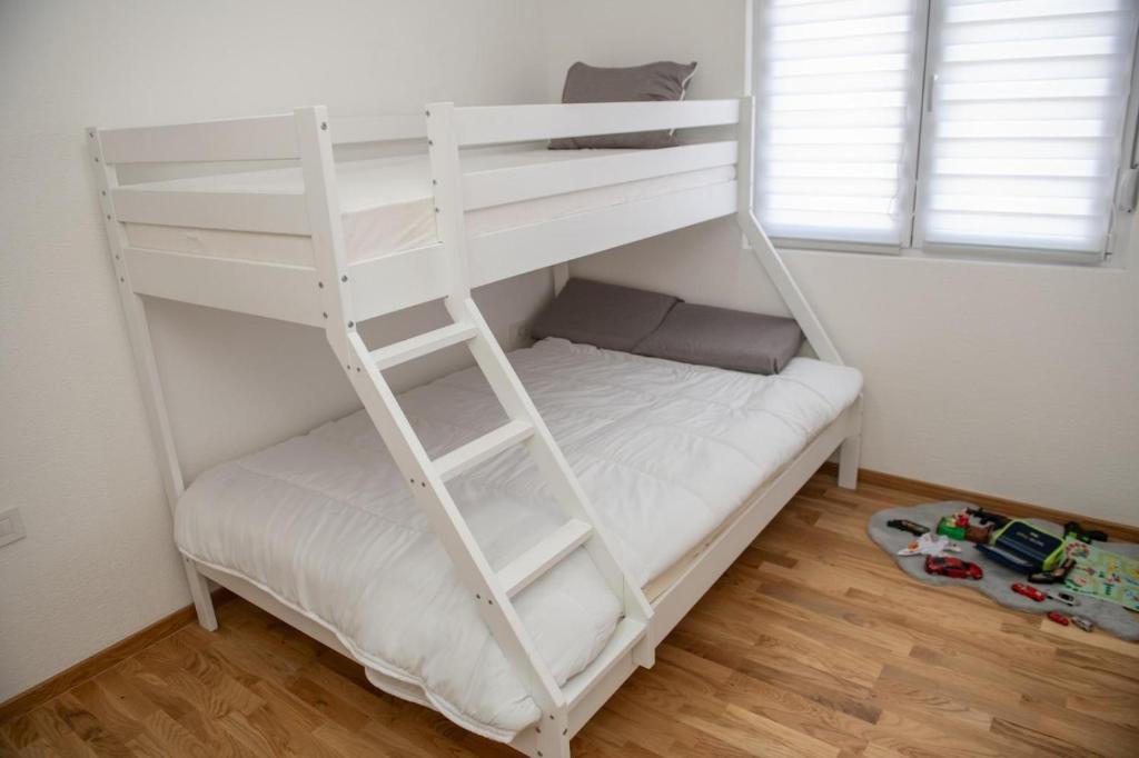 Postel nebo postele na pokoji v ubytování Apartman Tasic