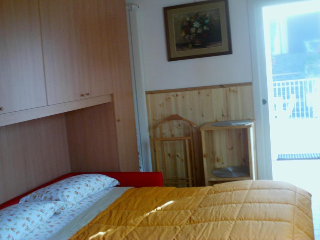 Postel nebo postele na pokoji v ubytování Affittacamere Le Meridiane