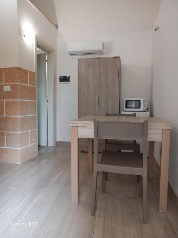 Kuchyň nebo kuchyňský kout v ubytování TORRE SUL MARE affittacamere Ugento
