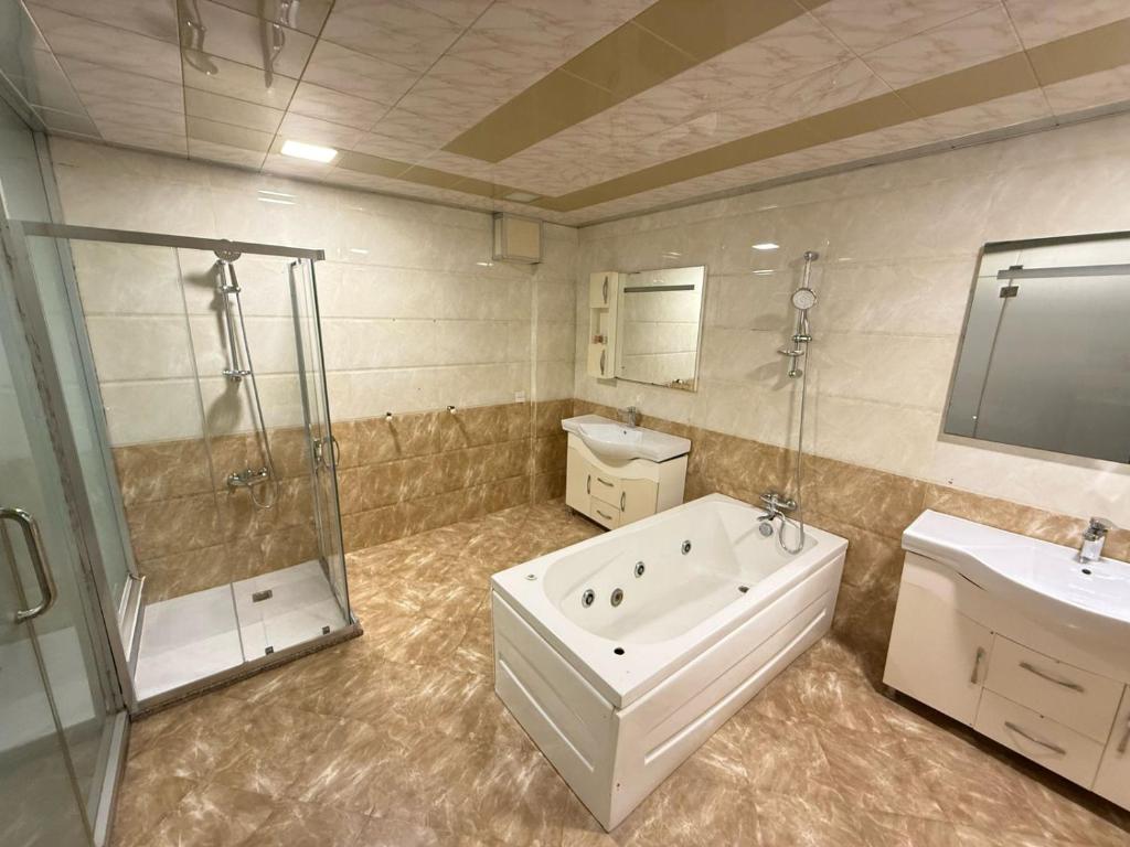 Koupelna v ubytování Amazon Hotel - Free Massage