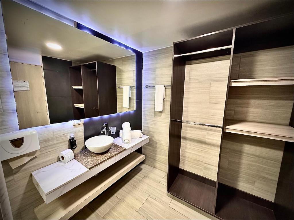 Koupelna v ubytování Hotel American Visa Normandia