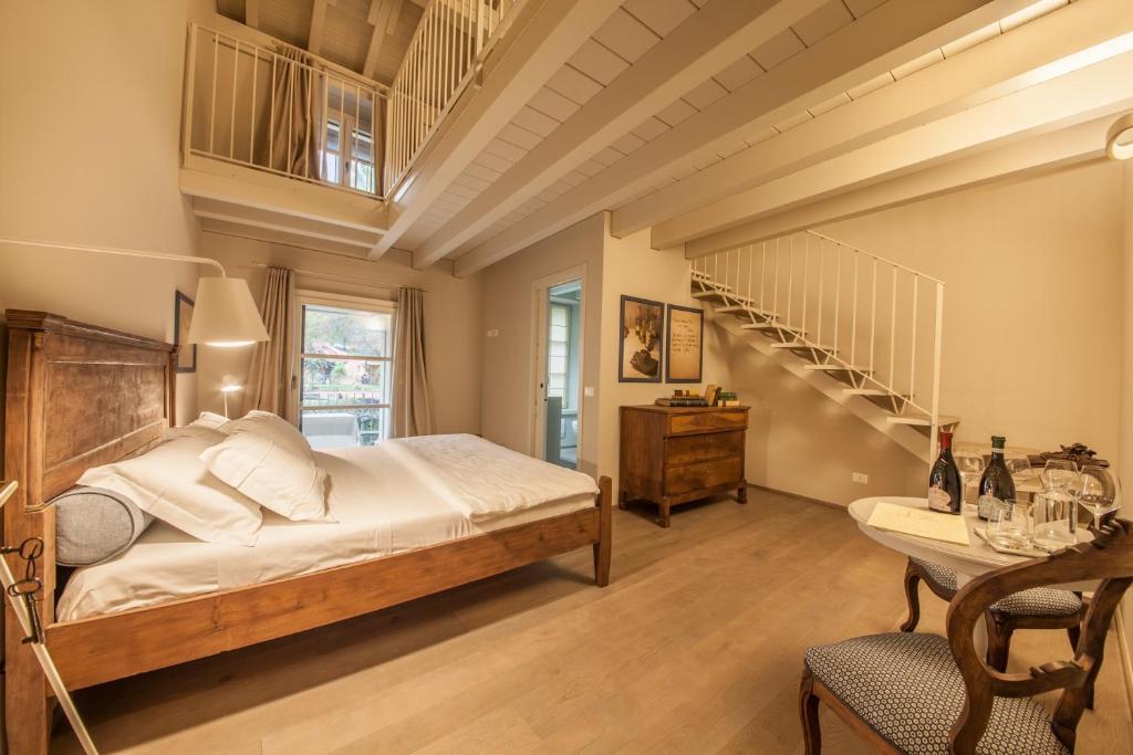 Posteľ alebo postele v izbe v ubytovaní B&B Antico Brolo