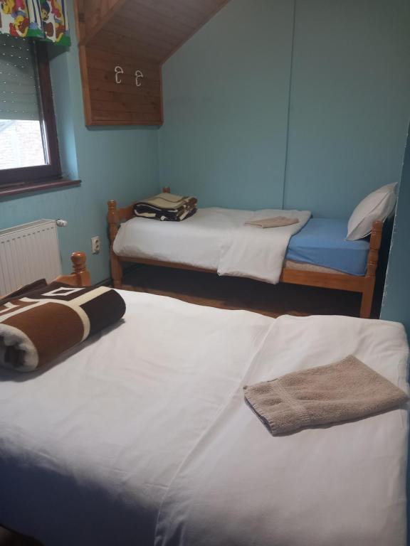 Postel nebo postele na pokoji v ubytování Apartmani Elko