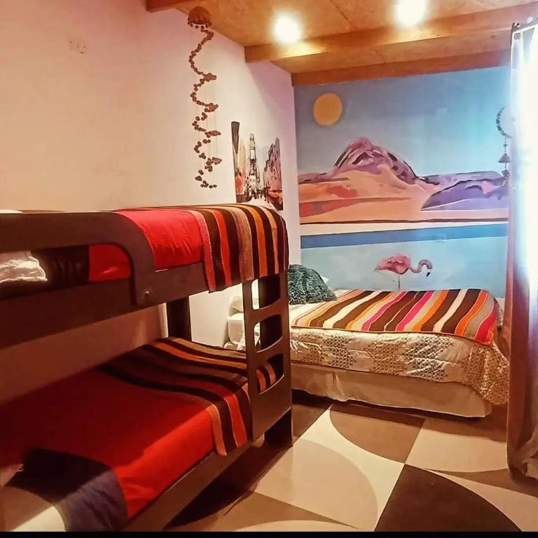 Postel nebo postele na pokoji v ubytování Desert Wings