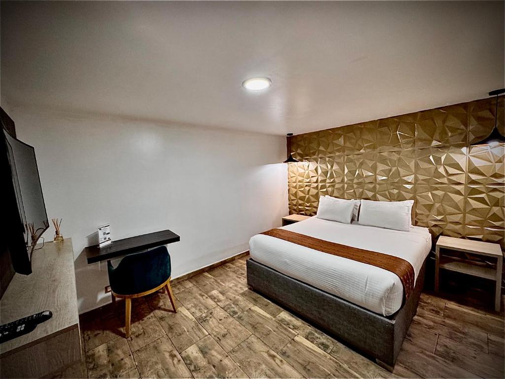 Postel nebo postele na pokoji v ubytování Hotel American Visa Normandia