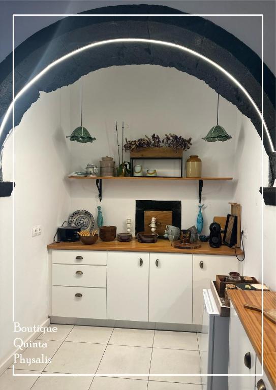 Kuchyň nebo kuchyňský kout v ubytování Boutique Quinta Physalis
