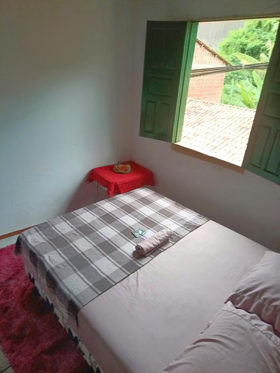 Postel nebo postele na pokoji v ubytování Covil das Trilhas