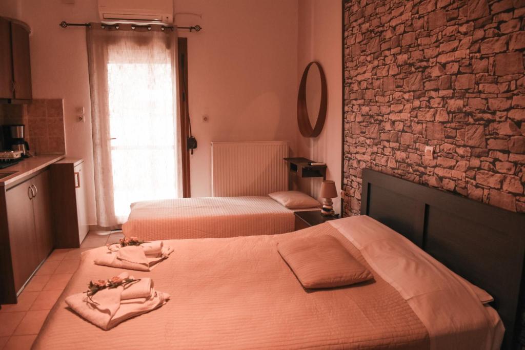 Postel nebo postele na pokoji v ubytování Cactus rooms