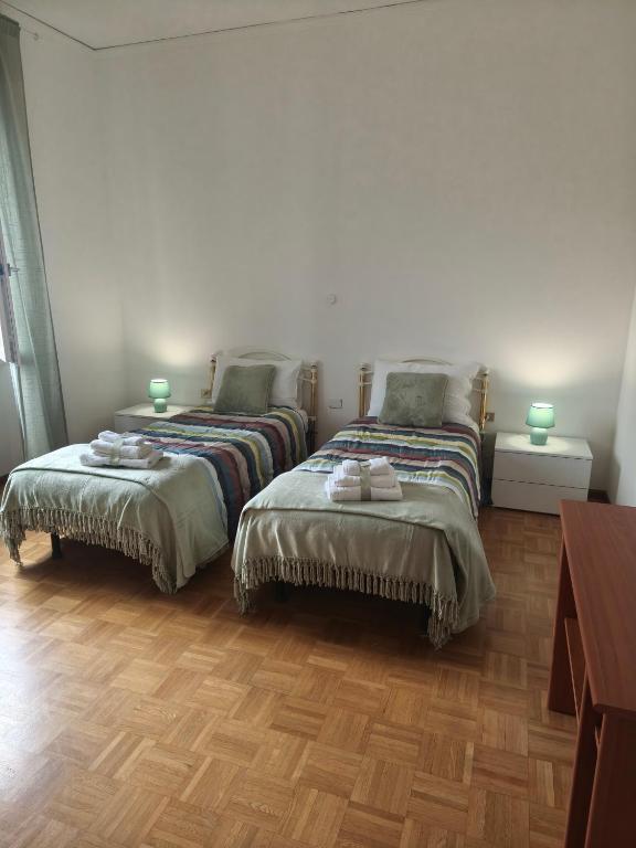 Postel nebo postele na pokoji v ubytování ROSI HOME