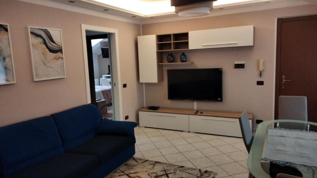 TV a/nebo společenská místnost v ubytování Corte Cacciatori