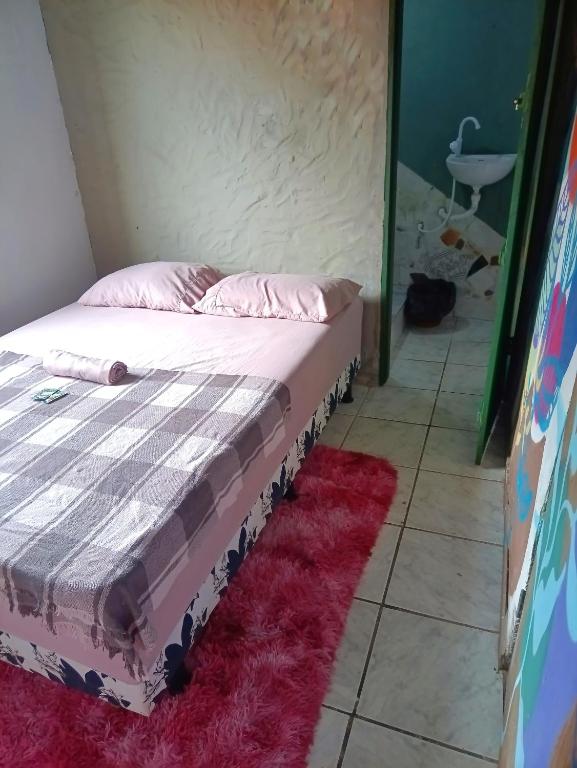 Postel nebo postele na pokoji v ubytování Covil das Trilhas