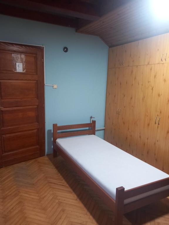 Postel nebo postele na pokoji v ubytování Apartmani Elko
