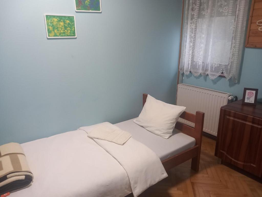 Postel nebo postele na pokoji v ubytování Apartmani Elko