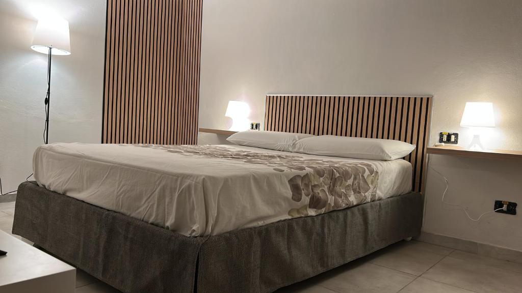 Postel nebo postele na pokoji v ubytování Grace 101