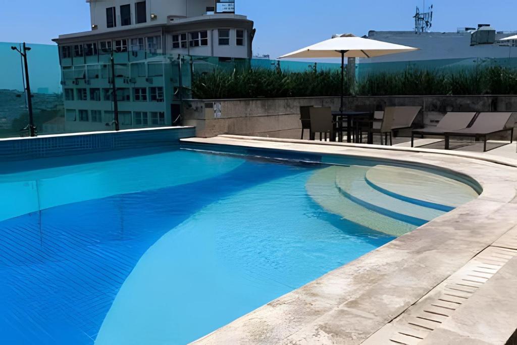 Бассейн в Studio c Piscina e Academia a 13 min de Copa. или поблизости