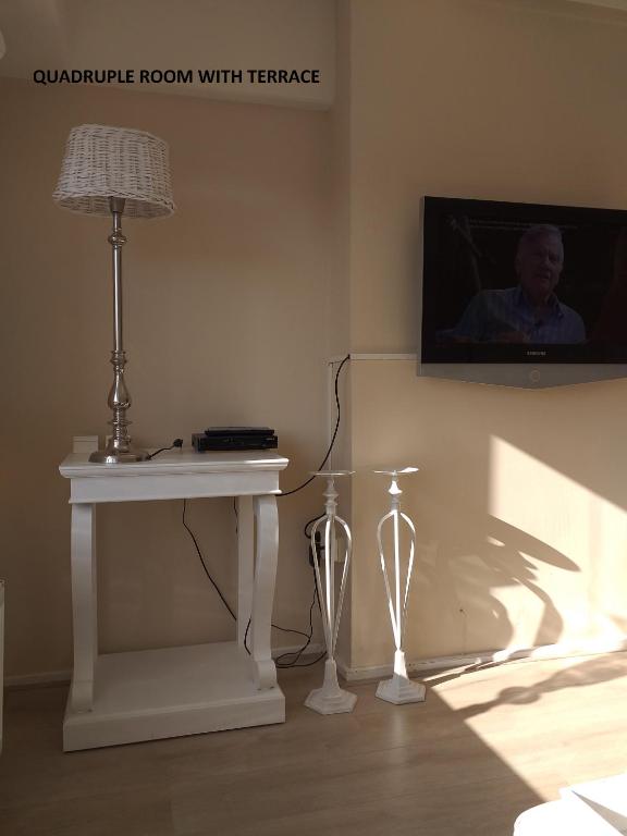 TV a/nebo společenská místnost v ubytování El Sol Zandvoort 2