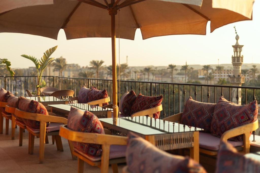 Balkón nebo terasa v ubytování Almas Pyramids View Hotel