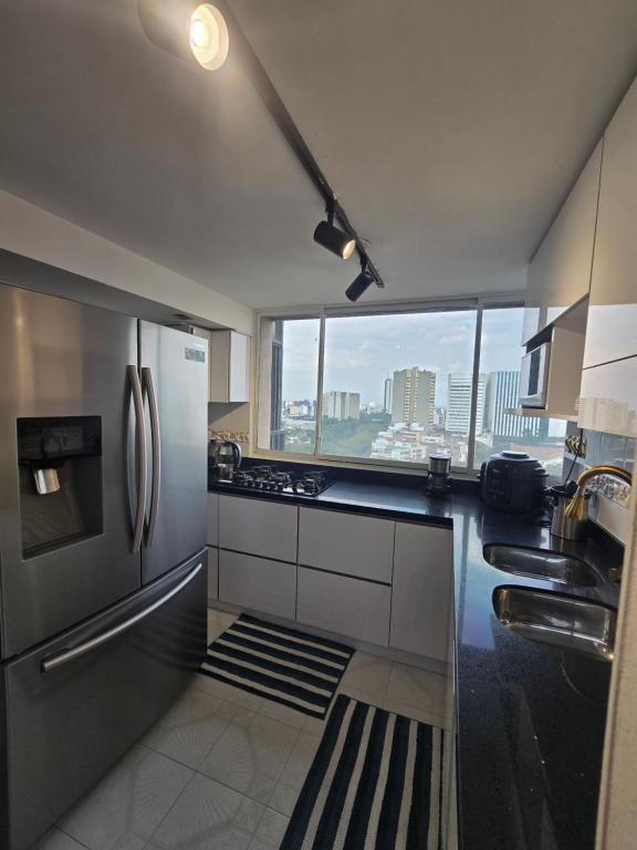 Η κουζίνα ή μικρή κουζίνα στο Penthouse