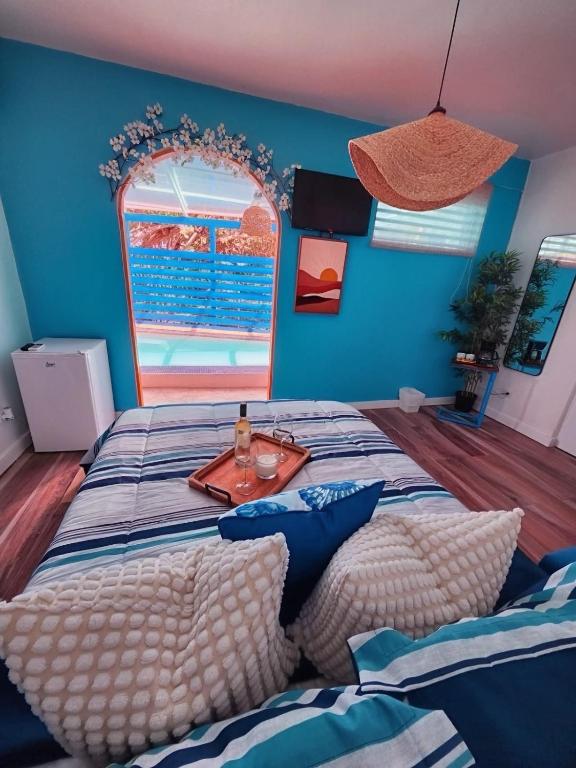 Postel nebo postele na pokoji v ubytování Parguera Beach Club & Hotel