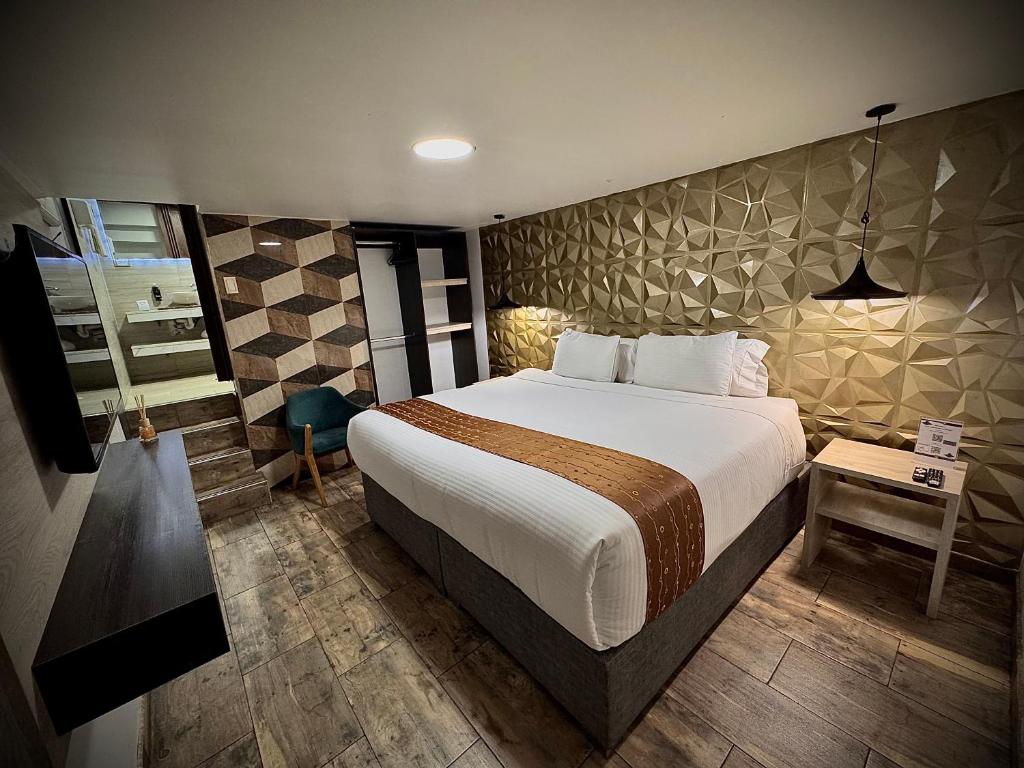 Postel nebo postele na pokoji v ubytování Hotel American Visa Normandia