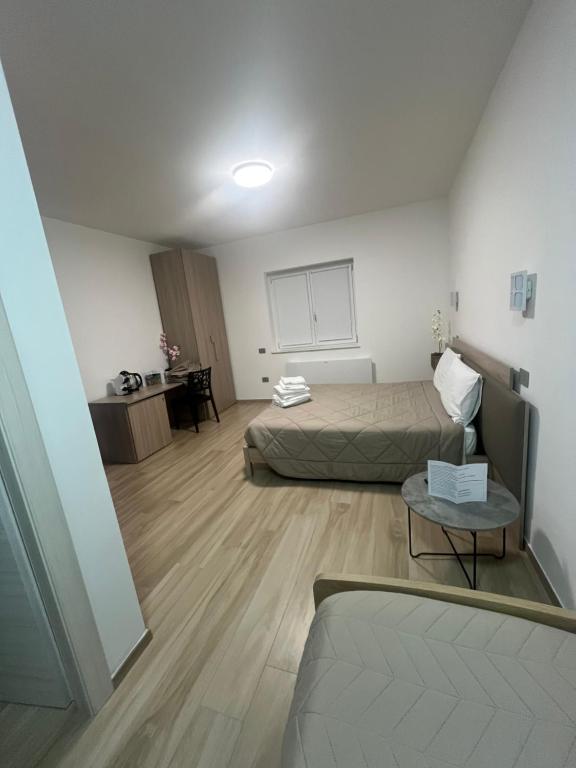 Postel nebo postele na pokoji v ubytování B&B La Terrazza Polifrone