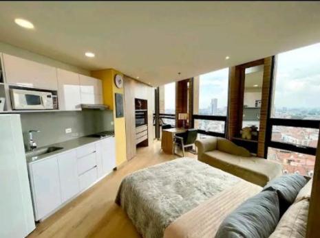 Η κουζίνα ή μικρή κουζίνα στο Junior Suite Centro Internacional